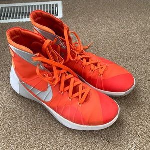 Orange and White Nike high top basketball shoes